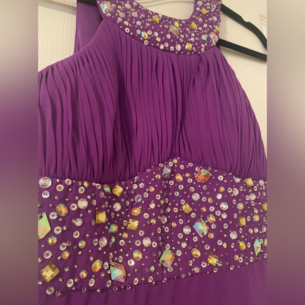 Long prom dress. Statement piece with rhinestones and ruffles.